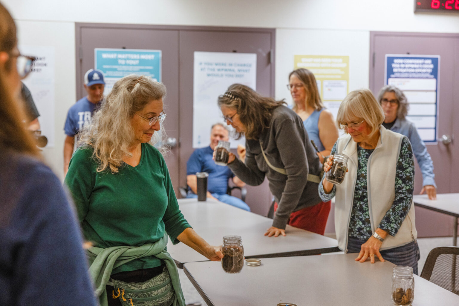 Attendees smell jars of various odors sourced from around the WPWMA's campus